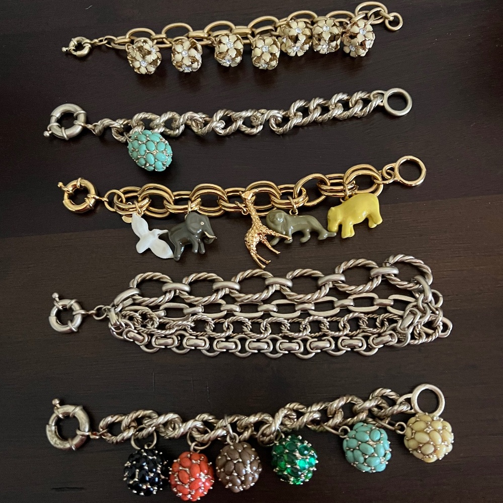 Set of five J Crew charm style bracelets
